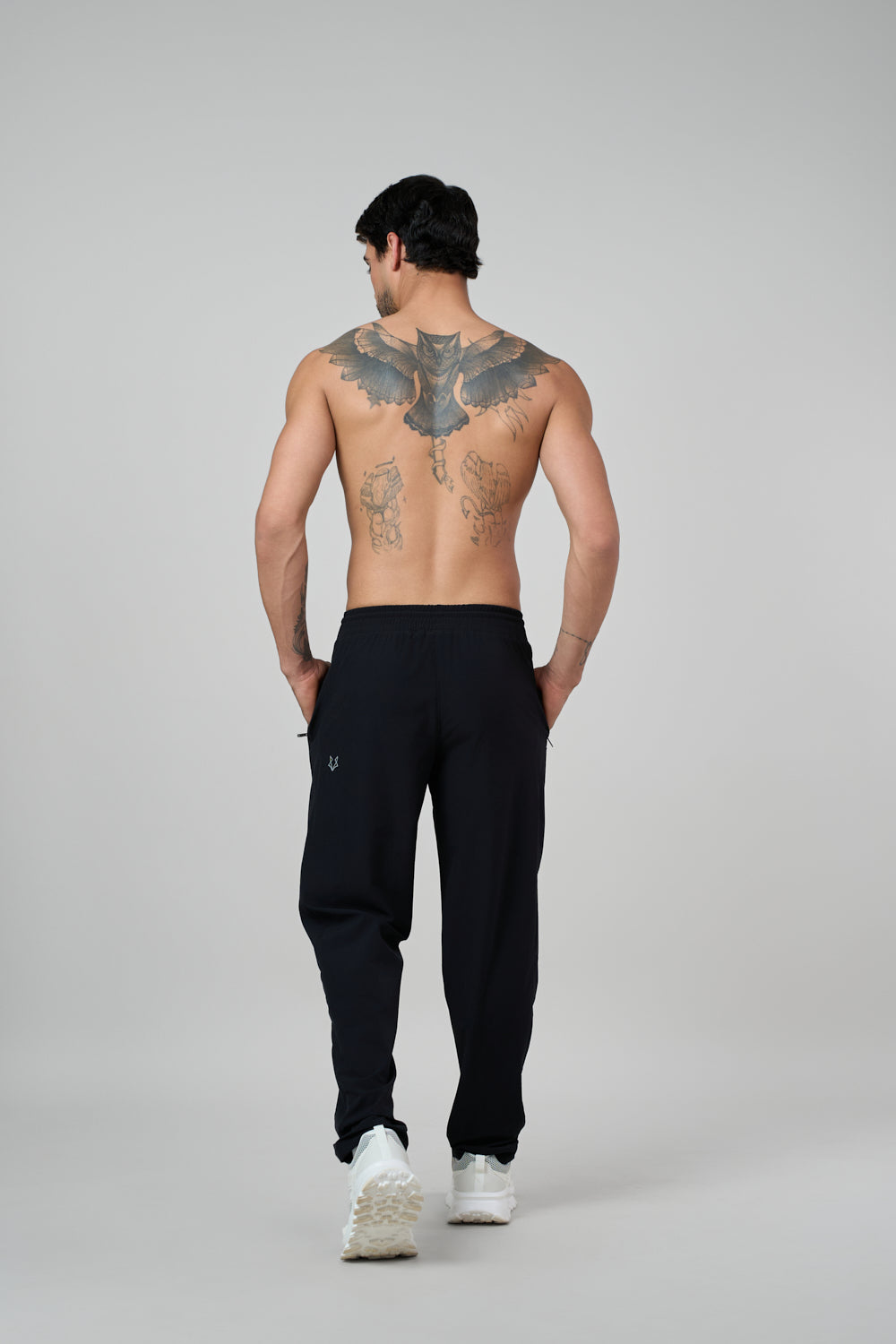 Black track pants front view