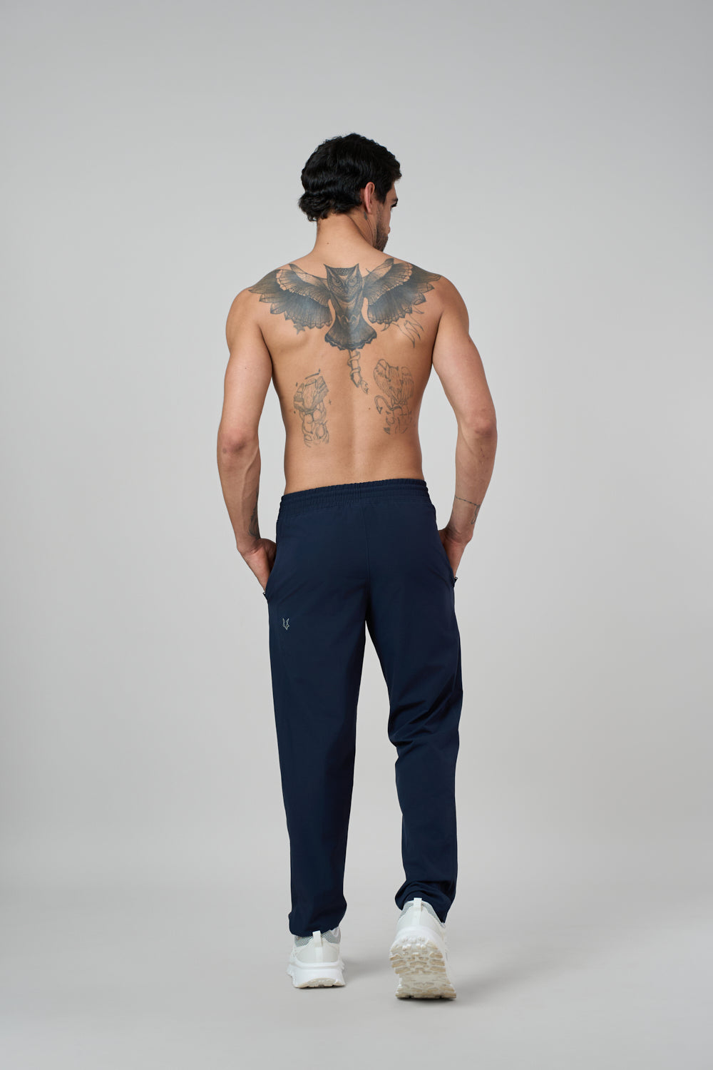 Blue track pants front view